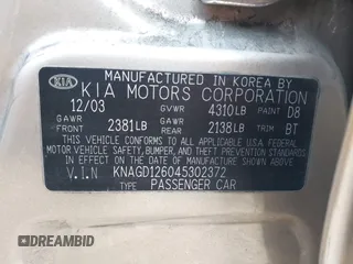 2004 Kia Optima LX z VIN KNAGD126045302372, wystawiony jako IAAI lot #41022315 z przebiegiem 199 588 mil mil oraz . Historia ofert i sprzedaży dostępna na DreamBid. Obrazek 9.