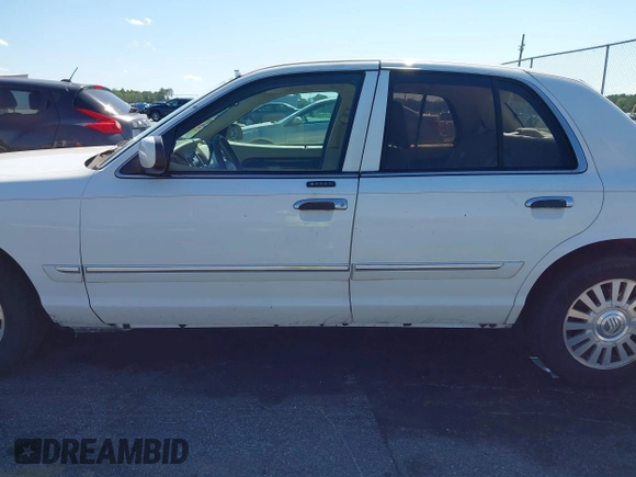 2006 Mercury Grand Marquis LS Premium z VIN 2MEFM75V46X614439, wystawiony jako IAAI lot #42319947 z przebiegiem 125 715 mil mil oraz . Historia ofert i sprzedaży dostępna na DreamBid. Obrazek 15.