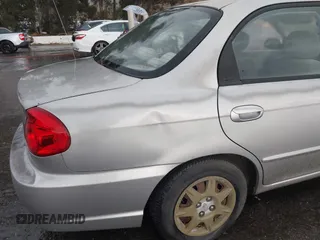2003 Kia Spectra z VIN KNAFB121135297834, wystawiony jako IAAI lot #42409441 z przebiegiem 84 621 mil mil oraz . Historia ofert i sprzedaży dostępna na DreamBid. Obrazek 6.