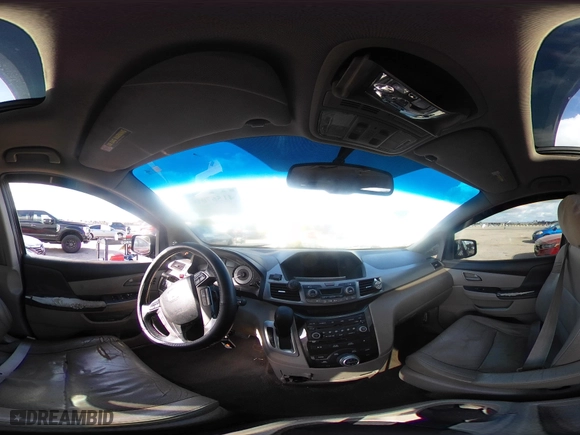2011 Honda Odyssey Touring with VIN 5FNRL5H97BB008759, listed as a IAAI auction lot 41567010 with 215,709 mi miles. Bid and sale history available at carsss.com. Image 18.