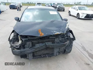 2014 Kia Forte LX with VIN KNAFX4A68E5145665, listed as a IAAI auction lot 42129786 with 192,514 mi miles and . Bid and sale history available at DreamBid. Image 6.