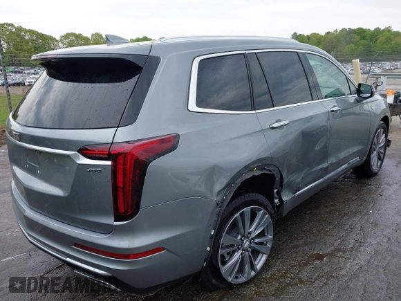 2024 Cadillac XT6 FWD Premium Luxury with VIN 1GYKPCRS0RZ748048, listed as a IAAI auction lot 42043117 with 7,232 mi miles. Bid and sale history available at carsss.com. Image 4.