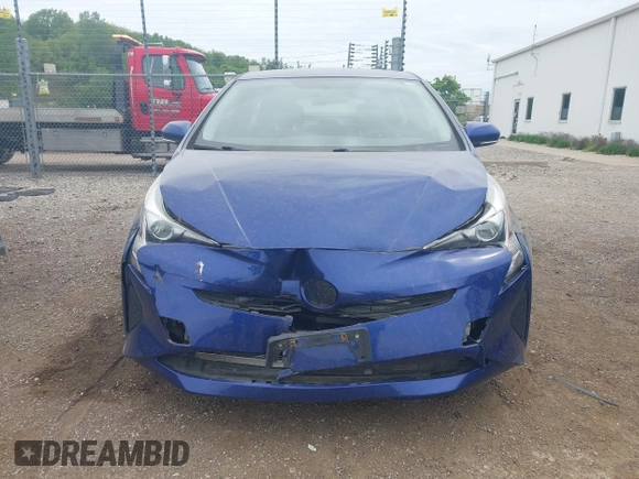 2016 Toyota Prius Two z VIN JTDKBRFU3G3511809, wystawiony jako IAAI lot #42295946 z przebiegiem 118 621 mil mil oraz . Historia ofert i sprzedaży dostępna na DreamBid. Obrazek 12.
