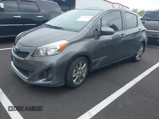 2014 Toyota Yaris L with VIN JTDKTUD38ED594008, listed as a IAAI auction lot 42114950 with 167,597 mi miles and . Bid and sale history available at DreamBid. Image 2.