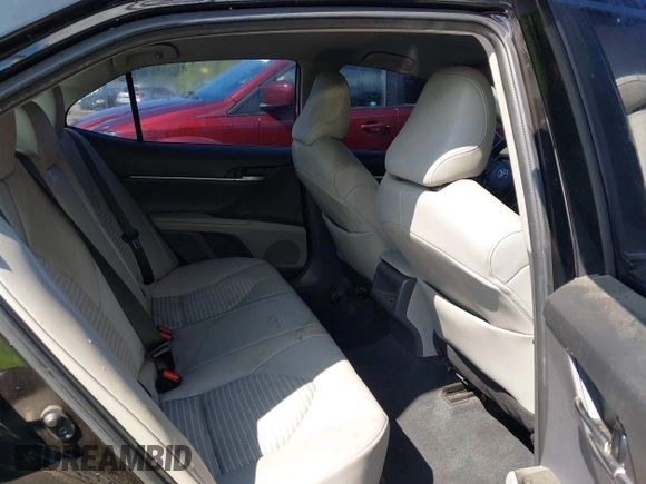 2022 Toyota Camry SE z VIN 4T1G11AK2NU499302, wystawiony jako IAAI lot #42233378 z przebiegiem 122 635 mil mil oraz . Historia ofert i sprzedaży dostępna na DreamBid. Obrazek 8.