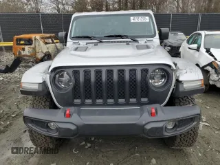 2023 Jeep Wrangler Rubicon Farout with VIN 1C4JJXFM4PW589923, listed as a Copart auction lot 48181205 with 9,814 mi miles and Salvage title. Bid and sale history available at DreamBid. Image 5.