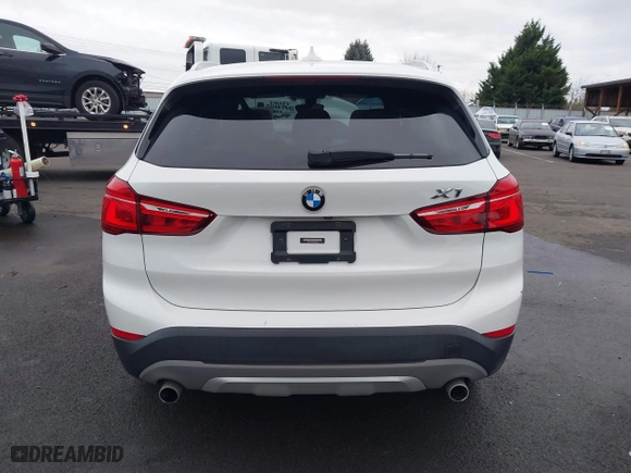 2018 BMW X1 sDrive28i with VIN WBXHU7C32J5H44246, listed as a IAAI auction lot 41477050 with 69,858 mi miles. Bid and sale history available at carsss.com. Image 16.