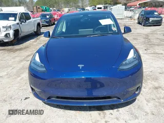 2021 Tesla Model Y Long Range with VIN 5YJYGAEE1MF207948, listed as a IAAI auction lot 41779570 with 100,859 mi miles. Bid and sale history available at carsss.com. Image 12.