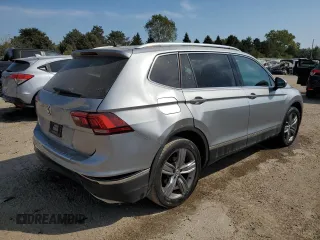 2021 Volkswagen Tiguan SE with VIN 3VV3B7AX8MM115493, listed as a Copart auction lot 71198794 with 34,958 mi miles and Salvage Title. Bid and sale history available at DreamBid. Image 3.