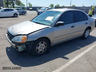 2001 Honda Civic LX with VIN 1HGES16591L002954, listed as a IAAI auction lot 42057695 with 238,849 mi miles. Bid and sale history available at carsss.com. Image 2.