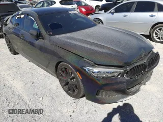 2020 BMW 8 Series M850i with VIN WBAGV8C04LBP48797, listed as a Copart auction lot 62884902 with 23,894 mi miles. Bid and sale history available at carsss.com. Image 1.