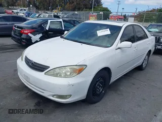 2003 Toyota Camry LE with VIN JTDBE32K530180834, listed as a IAAI auction lot 42255688 with 134,594 mi miles and . Bid and sale history available at DreamBid. Image 2.