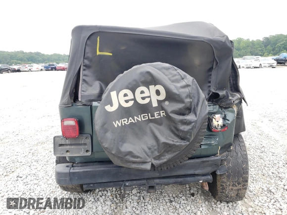 2003 Jeep Wrangler Sport with VIN 1J4FA49S03P330858, listed as a Copart auction lot 59519085 with Not provided miles and Salvage title. Bid and sale history available at DreamBid. Image 6.