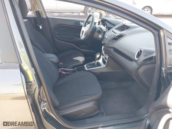 2016 Ford Fiesta SE with VIN 3FADP4BJ1GM143160, listed as a IAAI auction lot 41789400 with 96,908 mi miles. Bid and sale history available at carsss.com. Image 5.