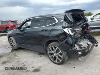 2020 BMW X2 sDrive28i with VIN WBXYH9C05L5R39182, listed as a Copart auction lot 56929605 with 87,253 mi miles and Non repairable. Bid and sale history available at DreamBid. Image 2.