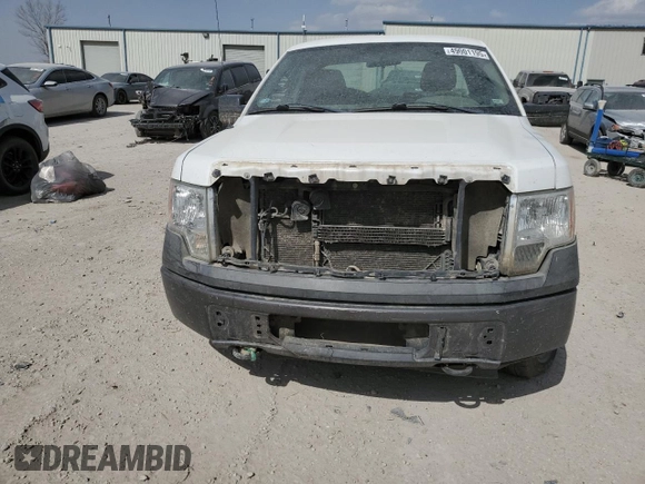 2009 Ford F-150 XL with VIN 1FTRF14W99KB43928, listed as a Copart auction lot 49001195 with 162,097 mi miles and Salvage title. Bid and sale history available at DreamBid. Image 5.