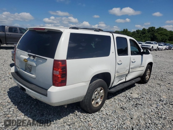 2013 Chevrolet Suburban LT with VIN 1GNSCJE0XDR146798, listed as a Copart auction lot 62408525 with 218,484 mi miles and Salvage title. Bid and sale history available at DreamBid. Image 3.