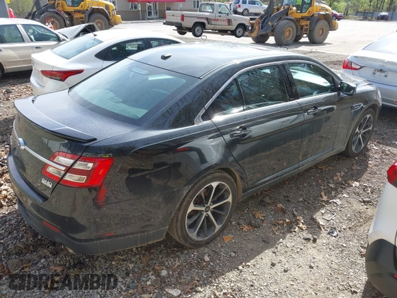 2014 Ford Taurus SHO with VIN 1FAHP2KT8EG131067, listed as a IAAI auction lot 42102086 with 107,822 mi miles. Bid and sale history available at carsss.com. Image 4.