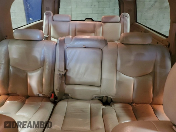 2003 Chevrolet Suburban LT z VIN 1GNFK16Z53J282237, wystawiony jako Copart lot #56275545 z przebiegiem 129 384 mil mil oraz Szkoda całkowita • Salvage title. Historia ofert i sprzedaży dostępna na DreamBid. Obrazek 10.