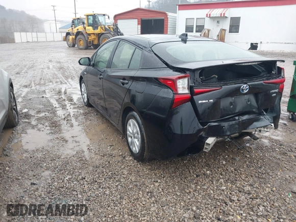 2021 Toyota Prius L Eco with VIN JTDKAMFU5M3145210, listed as a IAAI auction lot 41482234 with 85,600 mi miles and . Bid and sale history available at DreamBid. Image 3.