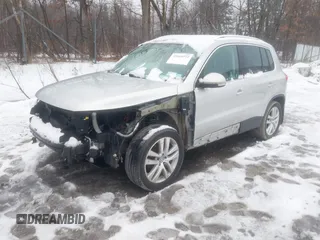 2011 Volkswagen Tiguan SE with VIN WVGBV7AX2BW513647, listed as a IAAI auction lot 41660772 with 86,042 mi miles and . Bid and sale history available at DreamBid. Image 2.