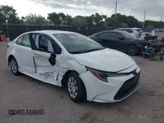 2023 Toyota Corolla LE z VIN JTDB4MEE0P3012666, wystawiony jako IAAI lot #41803601 z przebiegiem 6 838 mil mil oraz . Historia ofert i sprzedaży dostępna na DreamBid. Obrazek 1.