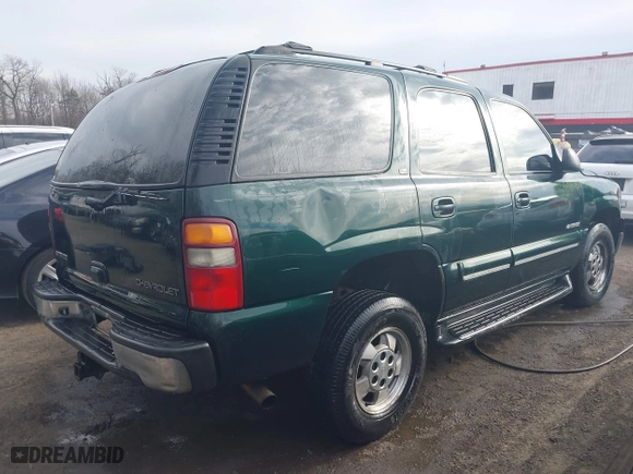 2002 Chevrolet Tahoe LT with VIN 1GNEK13ZX2J277968, listed as a IAAI auction lot 41586260 with 336,190 mi miles. Bid and sale history available at carsss.com. Image 4.
