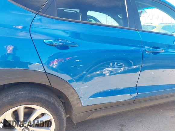 2018 Hyundai Tucson SE z VIN KM8J2CA40JU792495, wystawiony jako IAAI lot #42144647 z przebiegiem 62 769 mil mil oraz . Historia ofert i sprzedaży dostępna na DreamBid. Obrazek 17.