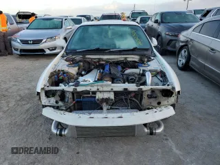 1995 Nissan Skyline z VIN ECR33060119, wystawiony jako Copart lot #76521404 z przebiegiem 134 480 mil mil oraz Szkoda całkowita • Salvage title. Historia ofert i sprzedaży dostępna na DreamBid. Obrazek 5.
