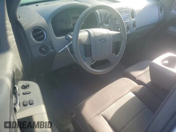 2005 Ford F-150 XL with VIN 1FTRF12W45NB13974, listed as a Copart auction lot 55701635 with 385,185 mi miles and Salvage title. Bid and sale history available at DreamBid. Image 8.