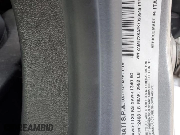 2019 Maserati Ghibli z VIN ZAM57XSA2K1328545, wystawiony jako Copart lot #56291895 z przebiegiem 53 625 mil mil oraz Tytuł czysty. Historia ofert i sprzedaży dostępna na DreamBid. Obrazek 12.
