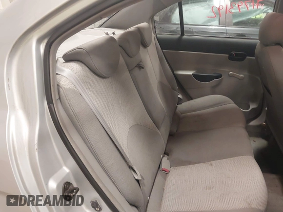 2006 Hyundai Accent GLS with VIN KMHCN46C06U004764, listed as a IAAI auction lot 41793192 with 182,841 mi miles. Bid and sale history available at carsss.com. Image 8.