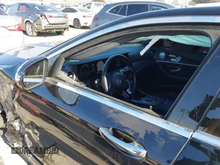 2021 Mercedes-Benz E-Class E 350 with VIN W1KZF8DB0MA889890, listed as a IAAI auction lot 41317094 with 63,075 mi miles. Bid and sale history available at carsss.com. Image 6.