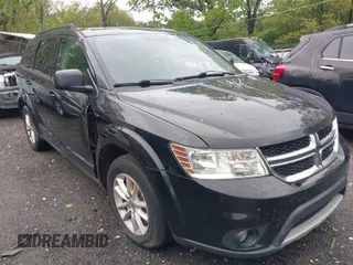 2016 Dodge Journey SXT with VIN 3C4PDCBG2GT100550, listed as a IAAI auction lot 41982670 with 184,601 mi miles. Bid and sale history available at carsss.com. Image 1.