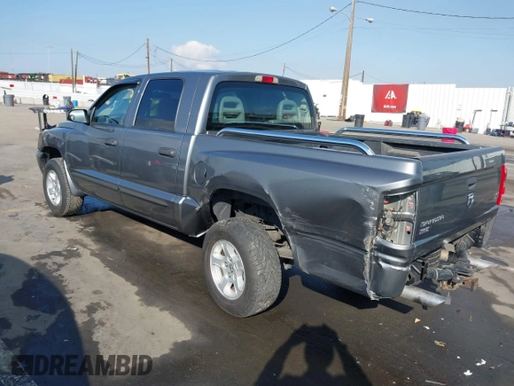 2005 Dodge Dakota SLT with VIN 1D7HE48N75S365305, listed as a IAAI auction lot 41450254 with 181,941 mi miles and . Bid and sale history available at DreamBid. Image 3.