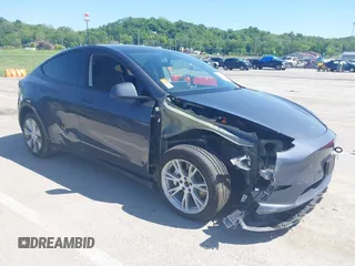 2023 Tesla Model Y Long Range z VIN 7SAYGDEE4PA037218, wystawiony jako IAAI lot #42232704 z przebiegiem 18 756 mil mil oraz . Historia ofert i sprzedaży dostępna na DreamBid. Obrazek 1.