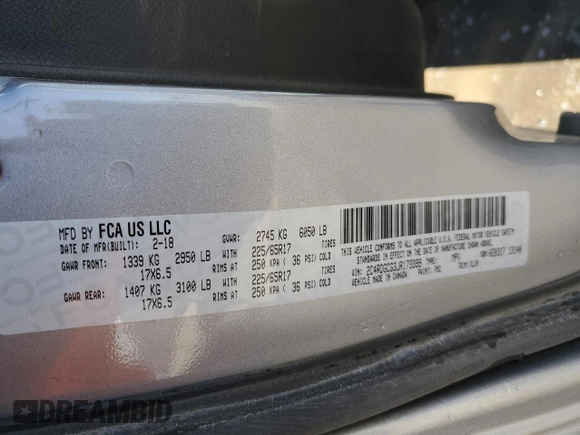 2018 Dodge Grand Caravan SXT with VIN 2C4RDGCG3JR173399, listed as a Copart auction lot 49734855 with 130,225 mi miles and Salvage Title. Bid and sale history available at DreamBid. Image 13.