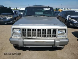 2001 Jeep Cherokee Sport z VIN 1J4FF58S61L540796, wystawiony jako Copart lot #62384895 z przebiegiem 209 294 mil mil oraz Czysty tytuł • Clean title. Historia ofert i sprzedaży dostępna na DreamBid. Obrazek 5.