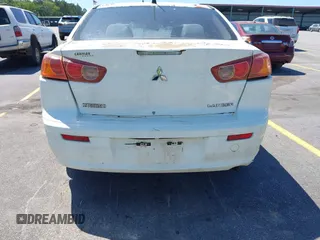 2009 Mitsubishi Lancer DE with VIN JA3AU16U29U040688, listed as a IAAI auction lot 42116109 with 202,015 mi miles. Bid and sale history available at carsss.com. Image 14.