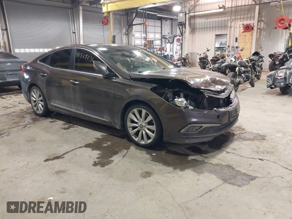2015 Hyundai Azera Limited z VIN KMHFH4JG2FA432545, wystawiony jako IAAI lot #41329236 z przebiegiem 98 661 mil mil oraz . Historia ofert i sprzedaży dostępna na DreamBid. Obrazek 1.
