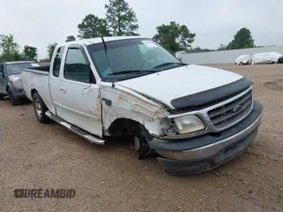 2000 Ford F-150 XL z VIN 1FTRX17LXYNA05021, wystawiony jako IAAI lot #42092275 z przebiegiem 115 979 mil mil oraz . Historia ofert i sprzedaży dostępna na DreamBid. Obrazek 1.