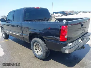 2006 Chevrolet Silverado 1500 LS with VIN 2GCEK13V561331599, listed as a IAAI auction lot 41990540 with 364,675 mi miles. Bid and sale history available at carsss.com. Image 3.