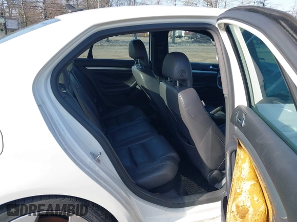 2009 Volkswagen Jetta GLI with VIN 3VWFJ71K89M073155, listed as a IAAI auction lot 41949089 with 138,772 mi miles and . Bid and sale history available at DreamBid. Image 8.