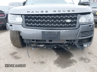 2015 Land Rover Range Rover HSE z VIN SALGS2VF8FA231130, wystawiony jako IAAI lot #41881459 z przebiegiem Nie podano mil oraz . Historia ofert i sprzedaży dostępna na DreamBid. Obrazek 6.
