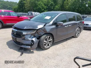 2022 Honda Odyssey Touring z VIN 5FNRL6H83NB023583, wystawiony jako IAAI lot #42425498 z przebiegiem Nie podano mil oraz . Historia ofert i sprzedaży dostępna na DreamBid. Obrazek 17.