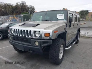 2005 Hummer H2 SUV with VIN 5GRGN23U95H129470, listed as a IAAI auction lot 42046654 with 63,489 mi miles. Bid and sale history available at carsss.com. Image 2.
