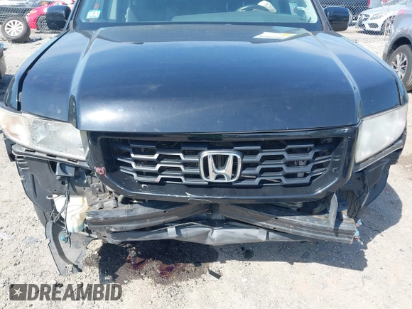 2010 Honda Ridgeline RTL z VIN 5FPYK1F56AB003730, wystawiony jako IAAI lot #42255351 z przebiegiem 190 630 mil mil oraz . Historia ofert i sprzedaży dostępna na DreamBid. Obrazek 6.
