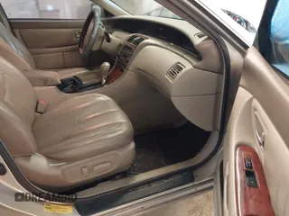 2004 Toyota Avalon XL z VIN 4T1BF28B34U366361, wystawiony jako IAAI lot #42219572 z przebiegiem 231 782 mil mil oraz . Historia ofert i sprzedaży dostępna na DreamBid. Obrazek 5.