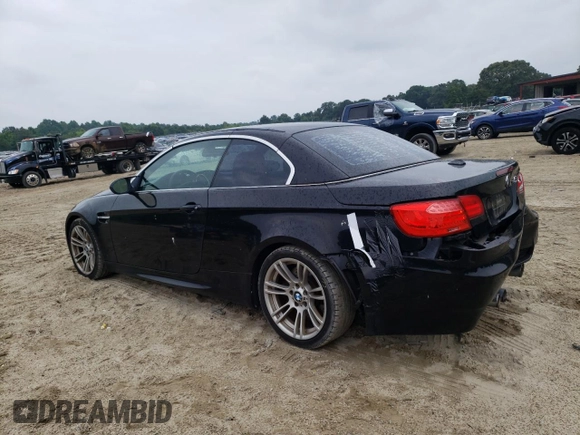 2011 BMW M3 with VIN WBSDX9C54BE584619, listed as a Copart auction lot 57599294 with 130,976 mi miles and Salvage Title. Bid and sale history available at carsss.com. Image 2.