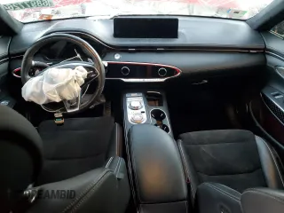 2022 Genesis GV70 Sport z VIN KMUMCDTC4NU010789, wystawiony jako Copart lot #68977264 z przebiegiem Nie podano mil oraz Czysty tytuł • Clean title. Historia ofert i sprzedaży dostępna na DreamBid. Obrazek 8.